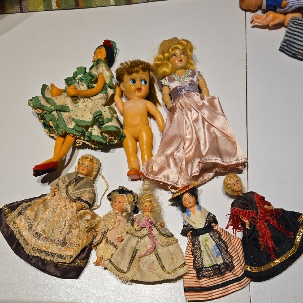 Vintage Doll Collection with Assorted Dresses